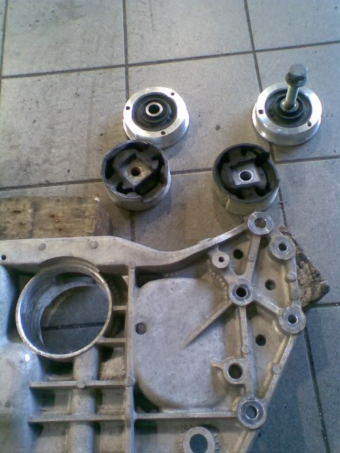 Two round mounts go into subframe before dogbone slides in   2
