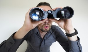man-looking-through-binoculars-600x360-300x180.jpg